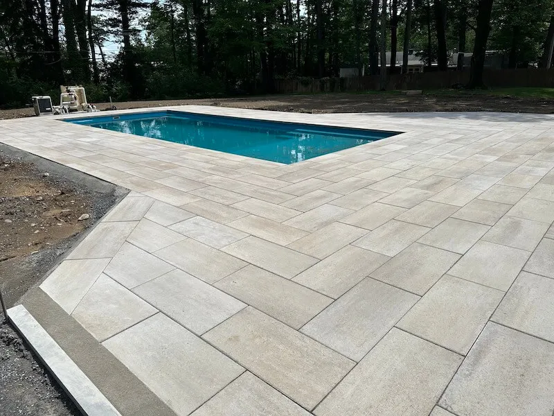new-pool-deck-installed-around-new-Imagine-Freedom-26-pool-in-Guilderland