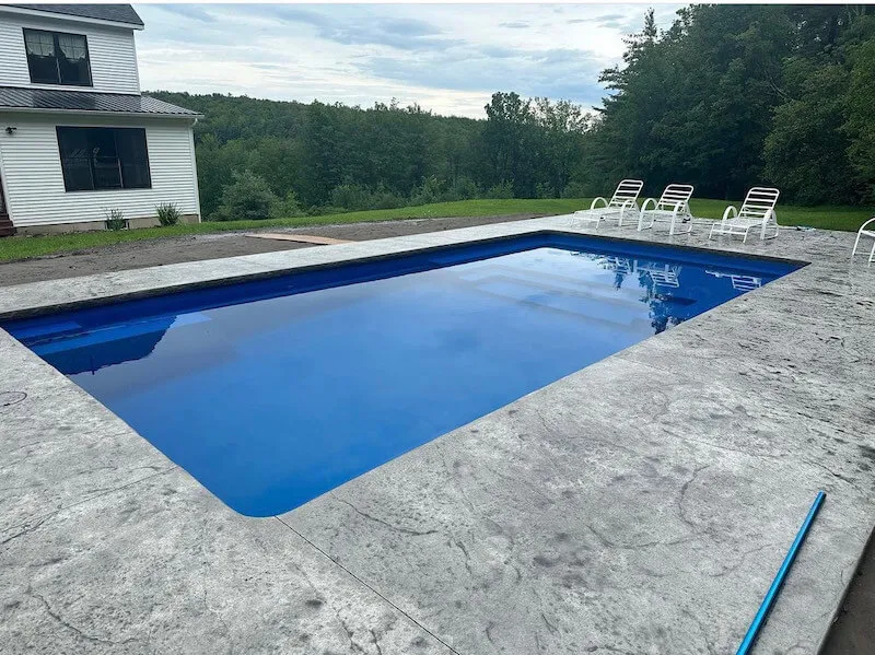 new-textured-concrete-pool-deck-installed-in-Johnsonville-around-a-new-Illusion-30-pool